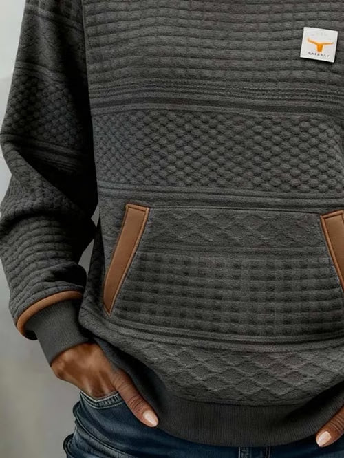 Suéter casual de mujer con estampado de bloques de color.